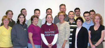 The IMS Team: Front row: Janis Beach, Jessica Lachewitz, Deb Hacker, Nicki Schussler, Linda Coyle, Jennifer Kaplan, Laurie Rich. Back row: Andrew Lafollette, Manfred Heinemann, Dave Annett, John Simpson, Chuck May, Michael Depry, Roger Cracel, Arianit Rukaj, Fabian Depry. (Not pictured: Scott Depuy.) 